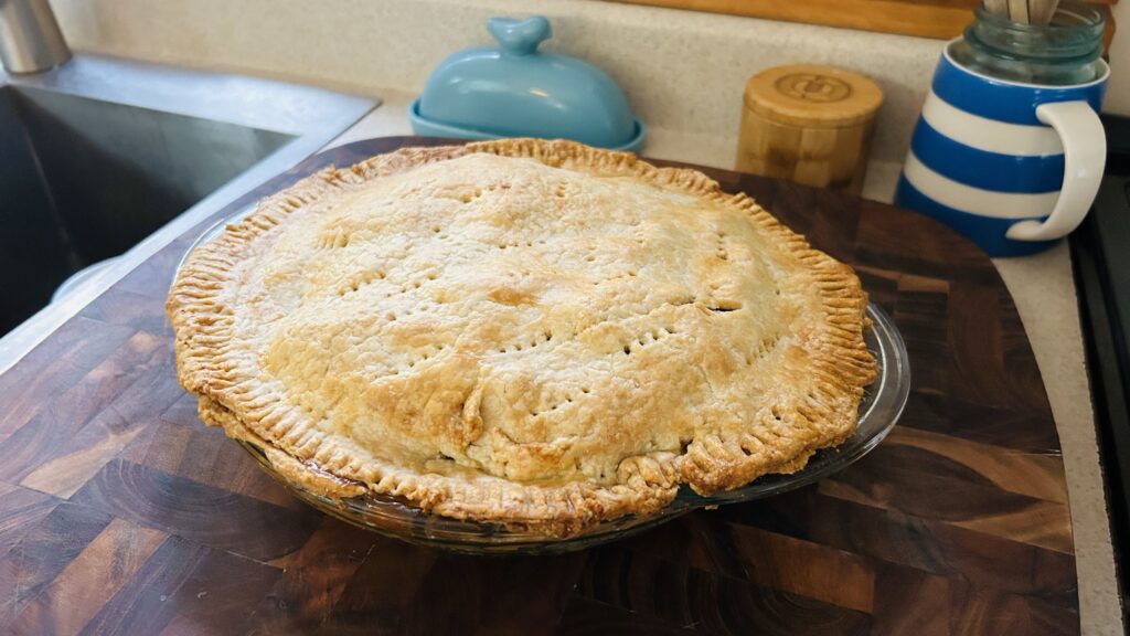 Freshly baked apple pie with an easy all butter crust.