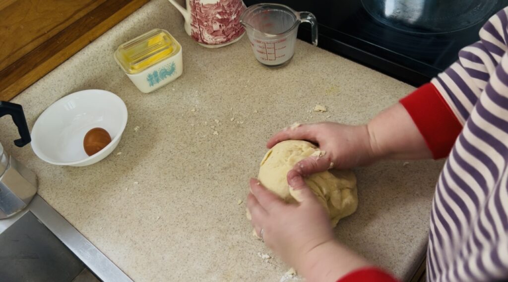 Scone dough getting ready to roll out for cutting.