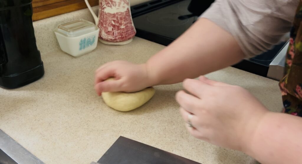 Kneading sourdough cracker dough. 