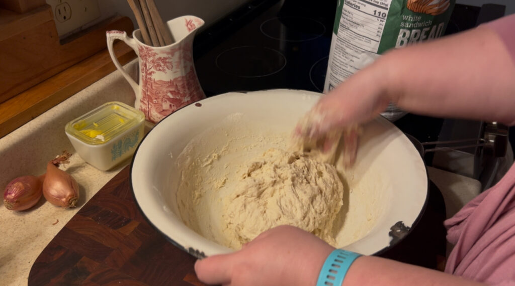 Mixing together dough for sourdough focaccia bread.