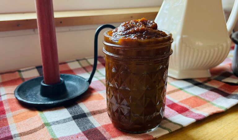 Jar of homemade slow cooker pumpkin butter.